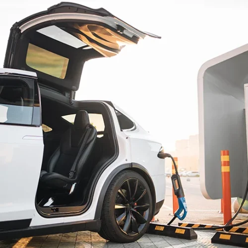modern-electric-car-charging-at-outdoors-ev-statio-2023-03-17-23-18-45-utc (1)